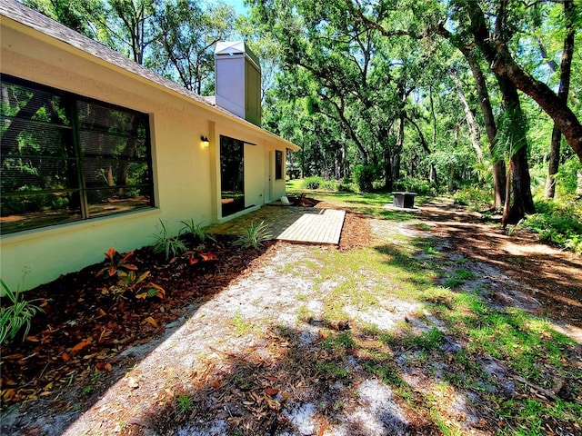 3529 Tanglewood Trl, Palm Harbor, FL 34685 - view of yard featuring a wooden deck