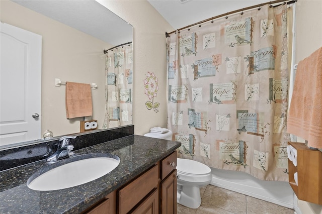 bathroom featuring toilet, shower / bath combo with shower curtain, tile patterned flooring, and vanity