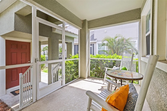 sunroom featuring a healthy amount of sunlight