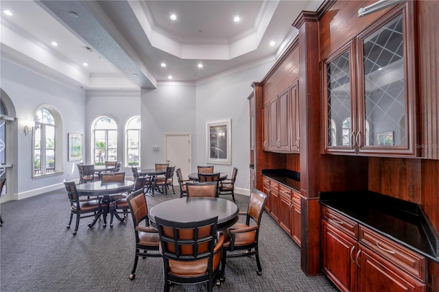 700 S Harbour Island Blvd Unit 342, Tampa, FL 33602 - dining area with dark carpet, a raised ceiling, recessed lighting, crown molding, and baseboards