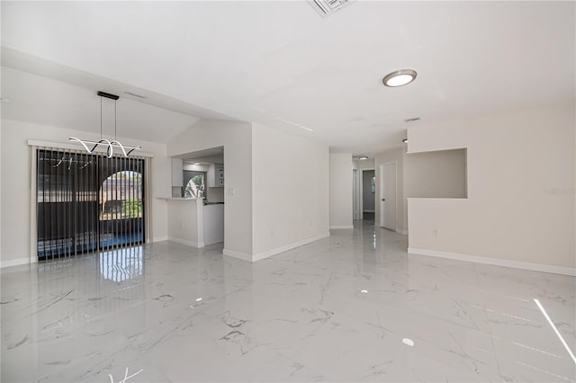 2167 Corfell St, Port Charlotte, FL 33948 - empty room featuring baseboards, light marble finish floors, and a chandelier