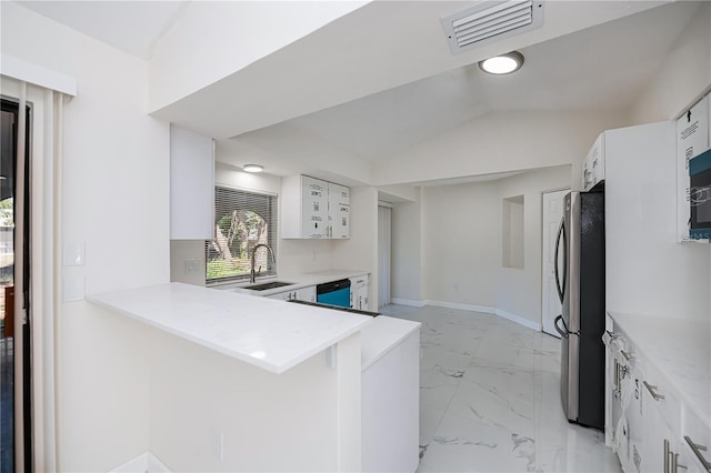 2167 Corfell St, Port Charlotte, FL 33948 - kitchen featuring dishwasher, freestanding refrigerator, a sink, light marble finish flooring, and white cabinets
