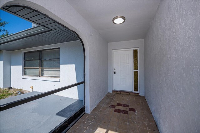 2167 Corfell St, Port Charlotte, FL 33948 - entrance to property with stucco siding