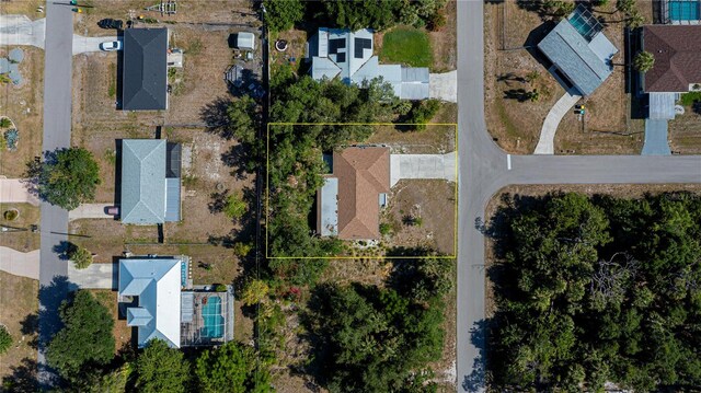 2167 Corfell St, Port Charlotte, FL 33948 - aerial view of residential area with property parcel outlined