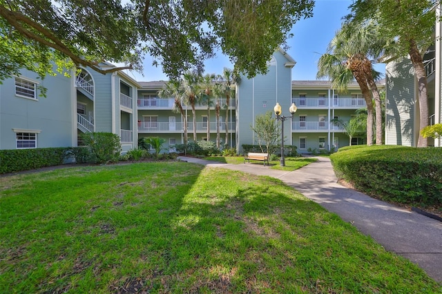 330 Promenade Dr Unit 206, Dunedin, FL 34698 - view of home's community with a lawn