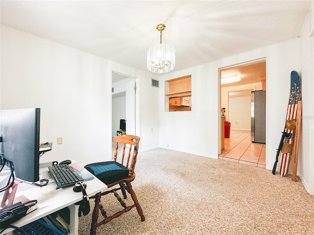 office featuring an inviting chandelier, baseboards, visible vents, and light carpet