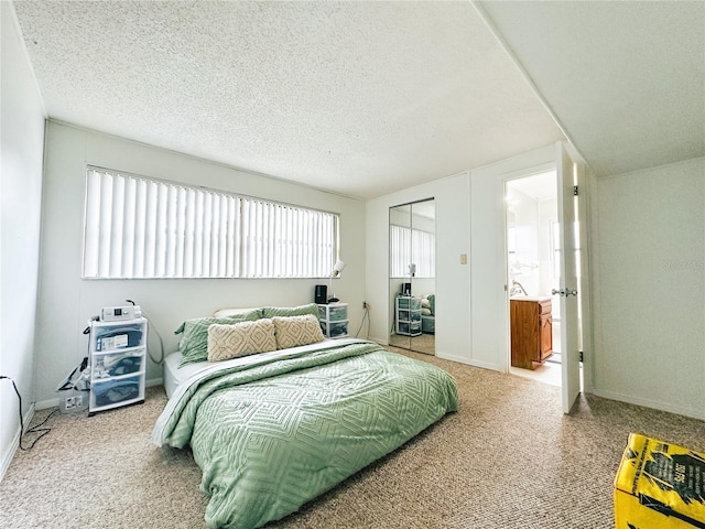 carpeted bedroom with a textured ceiling