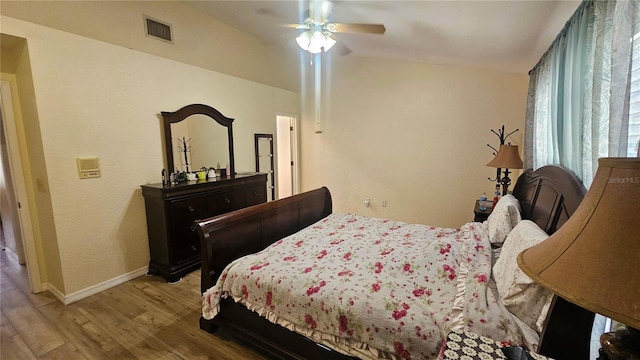 3086 Pointer Dr, Palm Harbor, FL 34683 - bedroom with wood finished floors, baseboards, and a ceiling fan
