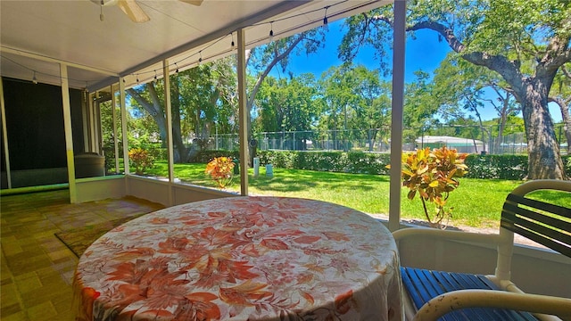 3086 Pointer Dr, Palm Harbor, FL 34683 - sunroom featuring a ceiling fan