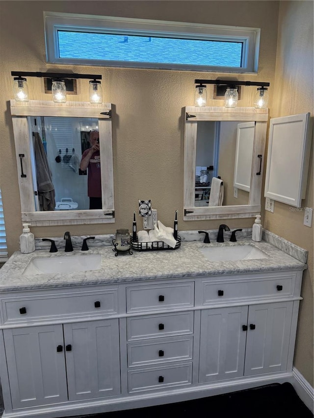 1747 Wood Brook St, Tarpon Springs, FL 34689 - full bathroom featuring double vanity and a shower with shower door