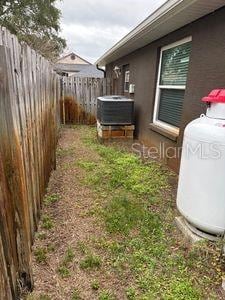 1747 Wood Brook St, Tarpon Springs, FL 34689 - view of yard with central air condition unit