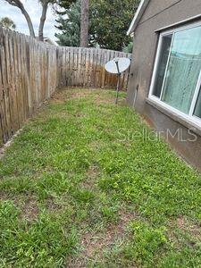 1747 Wood Brook St, Tarpon Springs, FL 34689 - view of fenced backyard