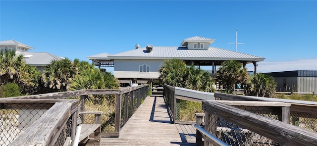 1747 Wood Brook St, Tarpon Springs, FL 34689 - rear view of property with metal roof