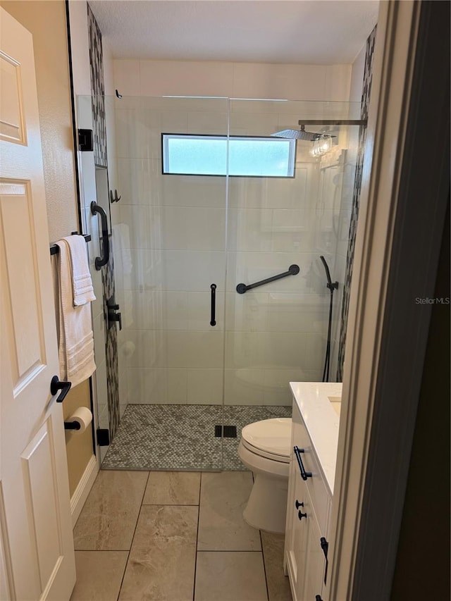 1747 Wood Brook St, Tarpon Springs, FL 34689 - bathroom featuring vanity, toilet, and a shower stall
