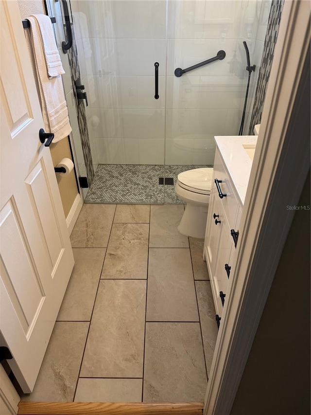 1747 Wood Brook St, Tarpon Springs, FL 34689 - bathroom with toilet, vanity, a shower stall, and tile patterned floors