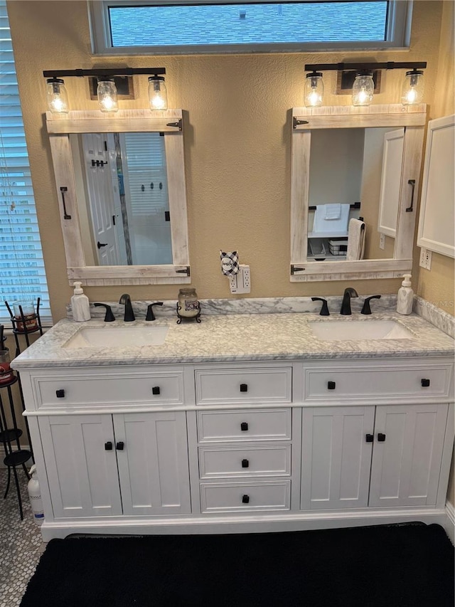 1747 Wood Brook St, Tarpon Springs, FL 34689 - bathroom with double vanity and a shower