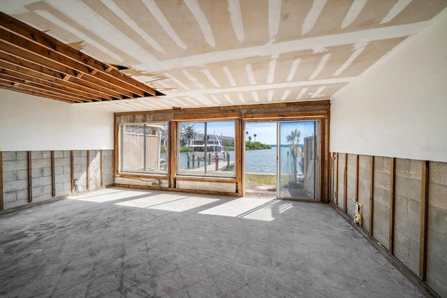 829 E Gulf Blvd Unit 107, Indian Rocks Beach, FL 33785 - carpeted spare room with a water view