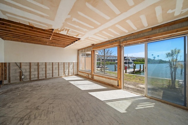 829 E Gulf Blvd Unit 107, Indian Rocks Beach, FL 33785 - unfurnished sunroom featuring a water view