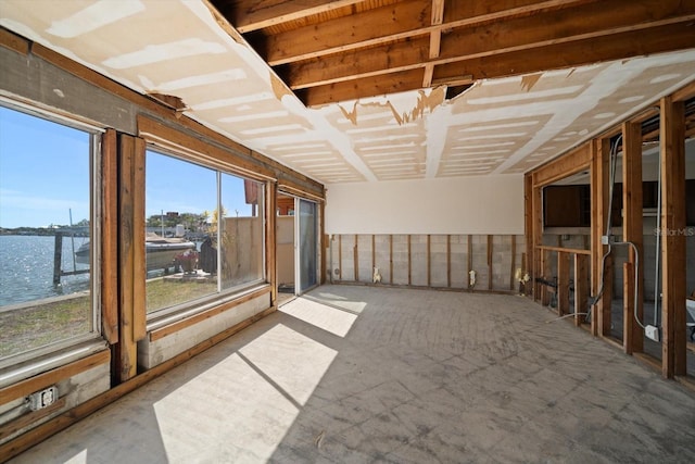 829 E Gulf Blvd Unit 107, Indian Rocks Beach, FL 33785 - unfurnished sunroom featuring a water view