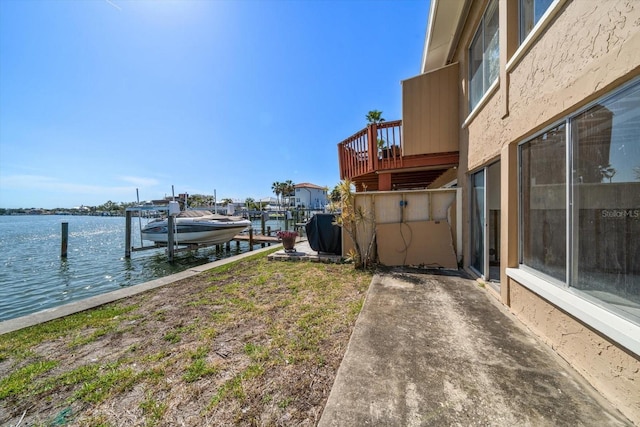 829 E Gulf Blvd Unit 107, Indian Rocks Beach, FL 33785 - dock featuring boat lift and a water view