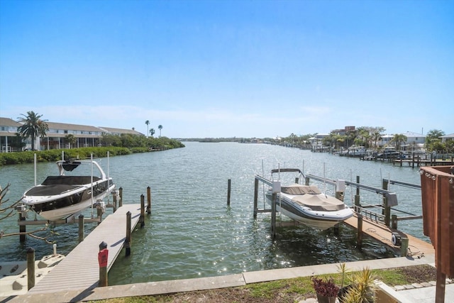 829 E Gulf Blvd Unit 107, Indian Rocks Beach, FL 33785 - dock featuring boat lift and a water view