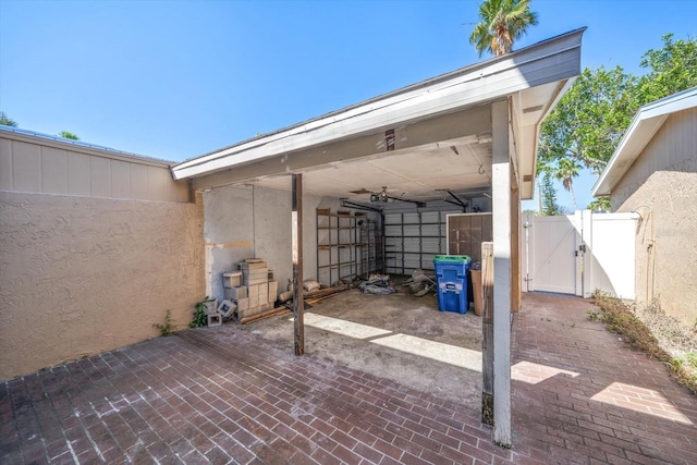 829 E Gulf Blvd Unit 107, Indian Rocks Beach, FL 33785 - view of patio / terrace featuring a gate