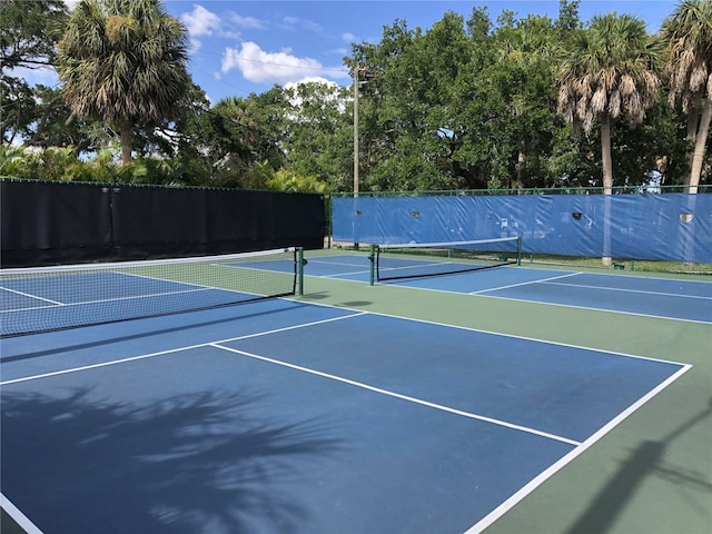 829 E Gulf Blvd Unit 107, Indian Rocks Beach, FL 33785 - view of tennis court featuring community basketball court