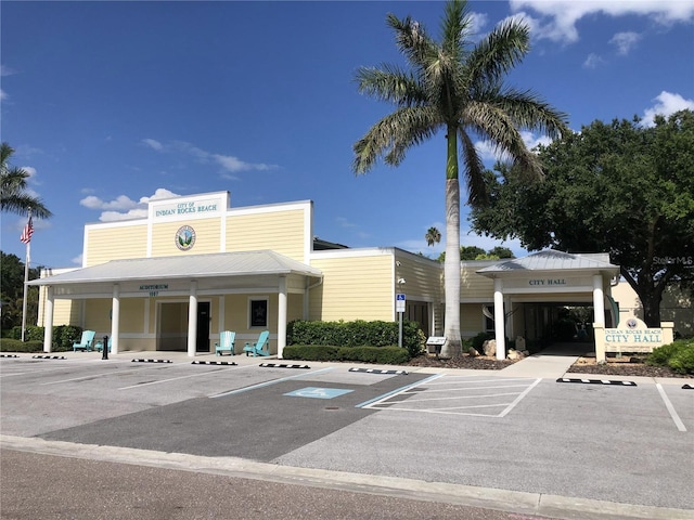 829 E Gulf Blvd Unit 107, Indian Rocks Beach, FL 33785 - view of property with uncovered parking