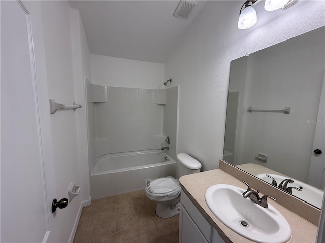 bathroom with visible vents, vanity, tub / shower combination, toilet, and tile patterned floors