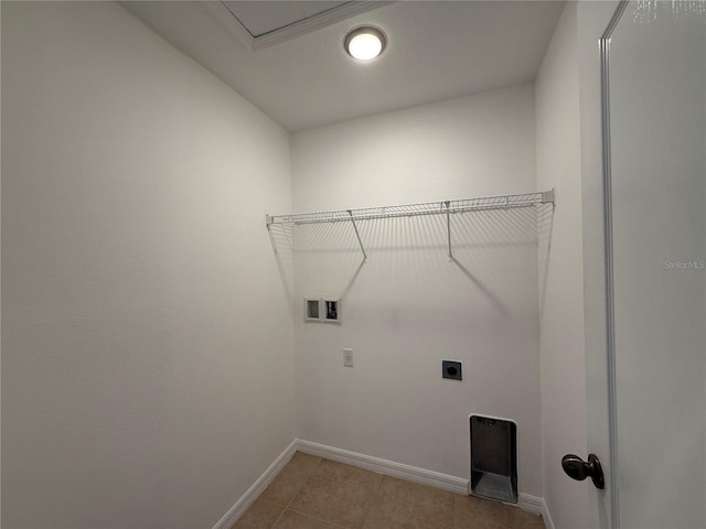 washroom with laundry area, light tile patterned flooring, baseboards, washer hookup, and hookup for an electric dryer