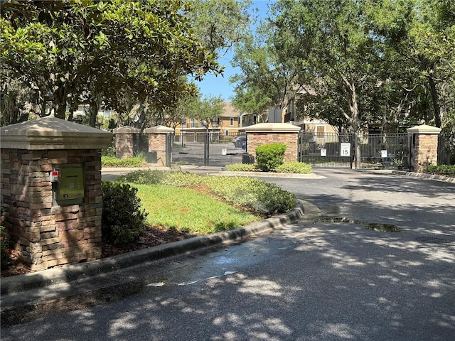 exterior space with a gate and fence
