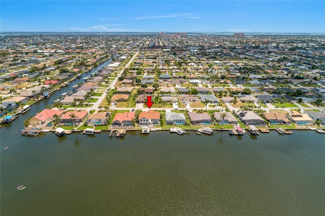 1109 SW 44th St, Cape Coral, FL 33914 - aerial overview of property's location with nearby suburban area and a nearby body of water