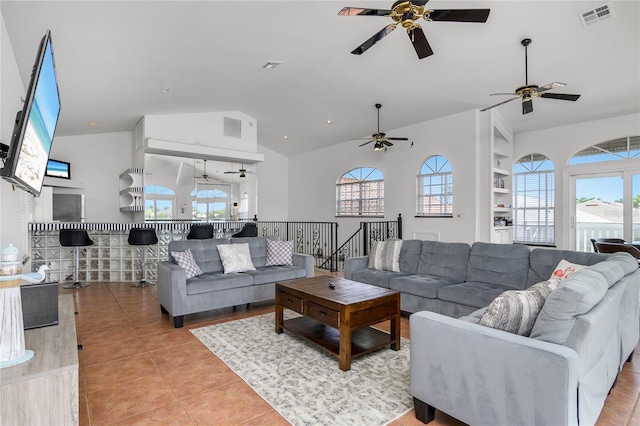 1109 SW 44th St, Cape Coral, FL 33914 - living room featuring ceiling fan, light tile patterned flooring, and high vaulted ceiling
