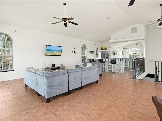 1109 SW 44th St, Cape Coral, FL 33914 - living area featuring ceiling fan, lofted ceiling, and light tile patterned floors