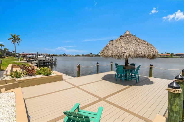 1109 SW 44th St, Cape Coral, FL 33914 - dock featuring a water view and boat lift