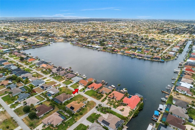 1109 SW 44th St, Cape Coral, FL 33914 - aerial overview of property's location featuring a large body of water and nearby suburban area