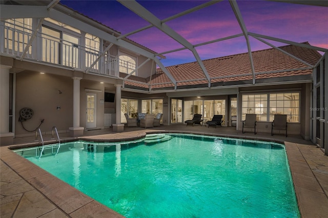 1109 SW 44th St, Cape Coral, FL 33914 - swimming pool featuring a patio area, glass enclosure, and an outdoor hangout area