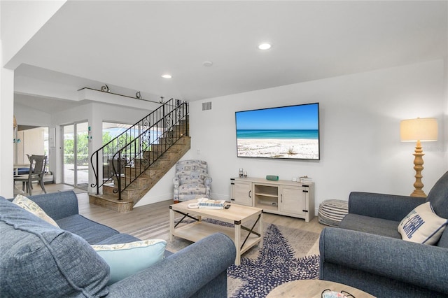 1109 SW 44th St, Cape Coral, FL 33914 - living area featuring wood finished floors, stairway, recessed lighting, and baseboards