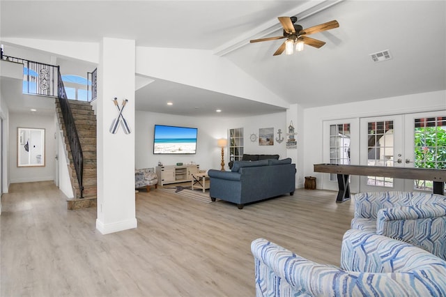 1109 SW 44th St, Cape Coral, FL 33914 - living room with stairway, beam ceiling, high vaulted ceiling, light wood-style flooring, and a ceiling fan