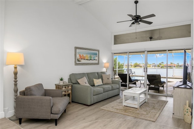 1109 SW 44th St, Cape Coral, FL 33914 - living area with high vaulted ceiling, ceiling fan, and wood finished floors