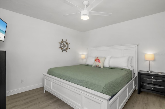 1109 SW 44th St, Cape Coral, FL 33914 - bedroom featuring light wood-style flooring, baseboards, and ceiling fan