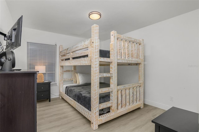 1109 SW 44th St, Cape Coral, FL 33914 - bedroom with wood finished floors and baseboards
