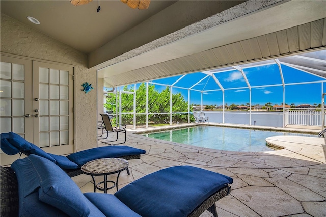 1109 SW 44th St, Cape Coral, FL 33914 - swimming pool with a patio area, ceiling fan, and a lanai