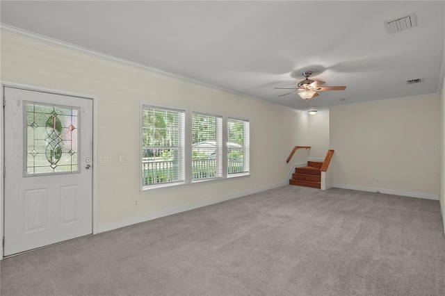 7165 Crk 655, Bushnell, FL 33513 - unfurnished living room with ornamental molding, light carpet, stairway, a ceiling fan, and baseboards