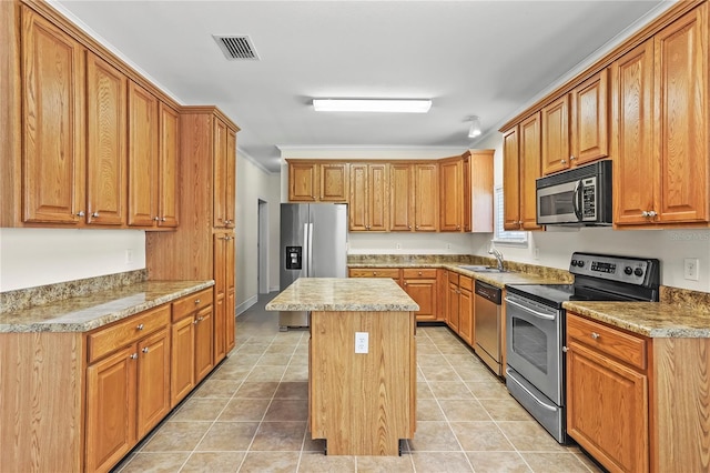 7165 Crk 655, Bushnell, FL 33513 - kitchen featuring appliances with stainless steel finishes, a center island, ornamental molding, light tile patterned flooring, and brown cabinetry