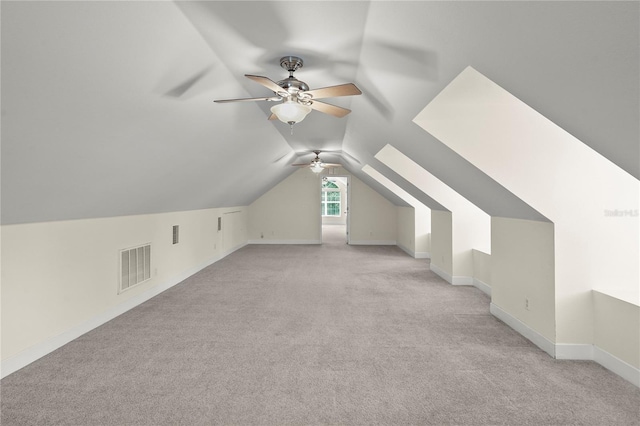 7165 Crk 655, Bushnell, FL 33513 - bonus room with ceiling fan, light carpet, lofted ceiling, and baseboards