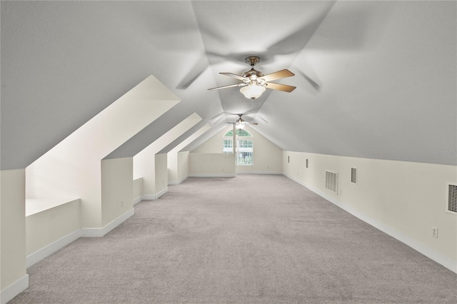 7165 Crk 655, Bushnell, FL 33513 - bonus room with ceiling fan, light colored carpet, lofted ceiling, and baseboards