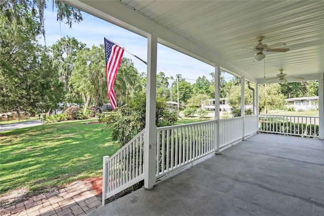 7165 Crk 655, Bushnell, FL 33513 - view of patio featuring a ceiling fan, covered porch, and view of wooded area