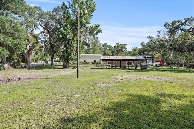 7165 Crk 655, Bushnell, FL 33513 - view of yard with a detached carport