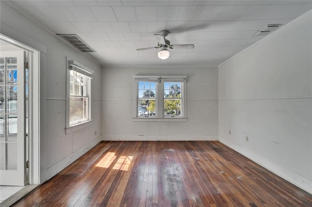 5603 Palmetto Rd, New Port Richey, FL 34652 - empty room with visible vents, a ceiling fan, wood-type flooring, and baseboards